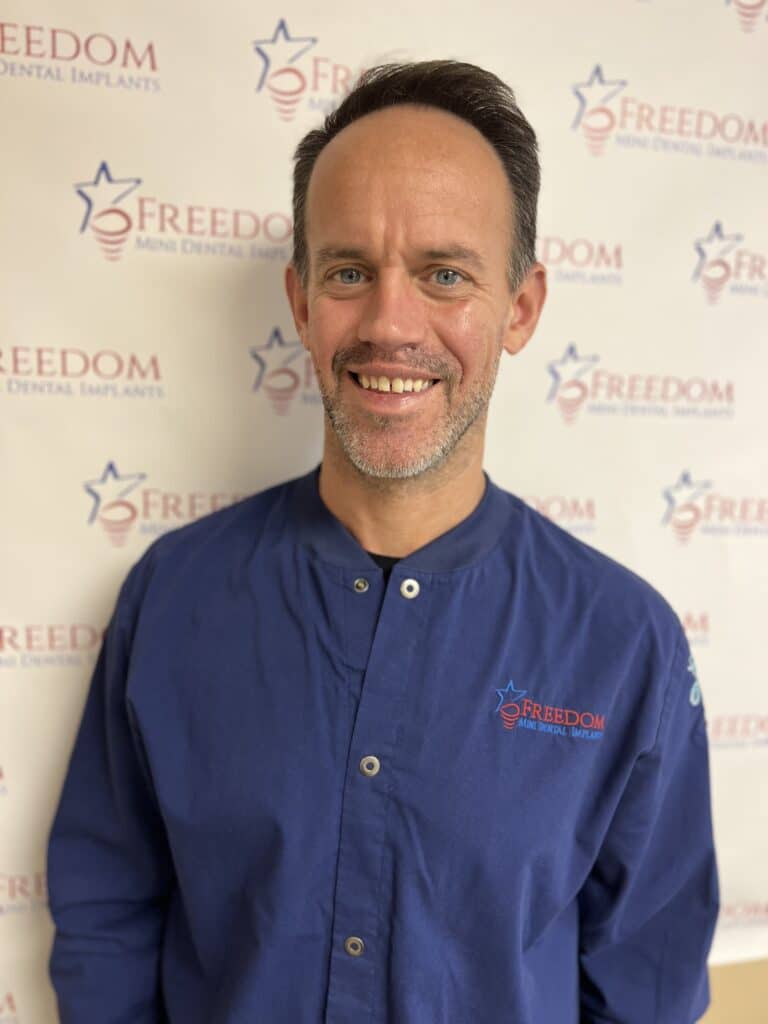 John Ackerman, chairside assistant at Freedom Dental Implants