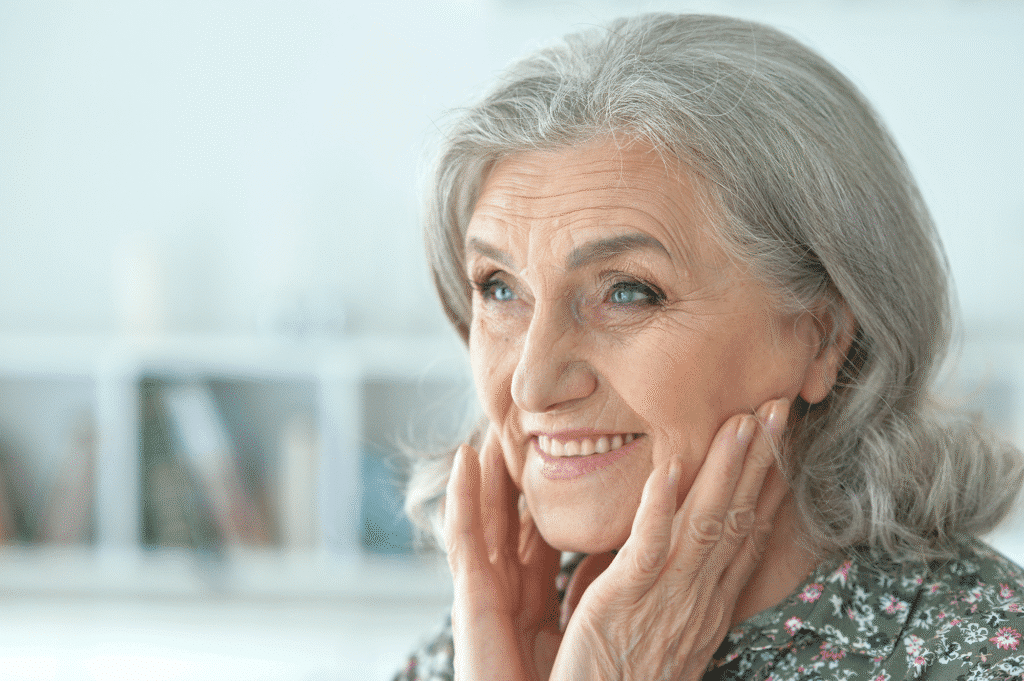 Smiling older woman with silver hair