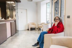Patient smiling calmly at a recovery consult in Louisville