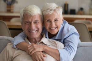 Smiling older couple enjoying time together at home