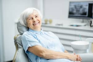 Confident Louisville patient smile after care for crowded teeth