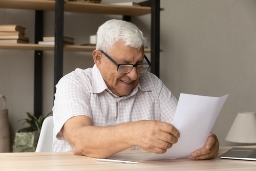 Patient reviewing mini dental implant cost options in Louisville