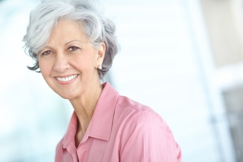 Patient smile after reviewing a second opinion implant plan in Louisville
